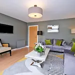 Bright And Spacious Home With A Balcony And City Views